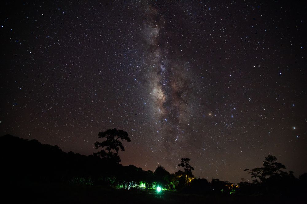Milky way galaxy with stars and space dust in the universe at PhuHinRongkla Ntional Park