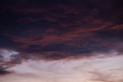 Red purple clouds in the evening sky