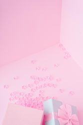 Pink and baby blue jewelry gift box with pink star decorations pouring out