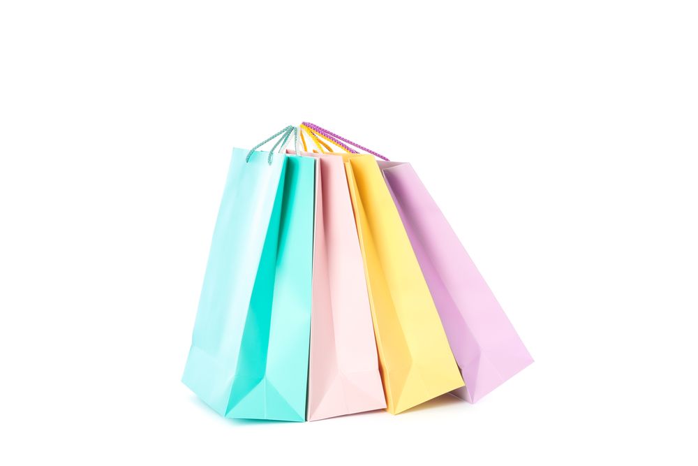 Multicolor paper bags isolated on blank background