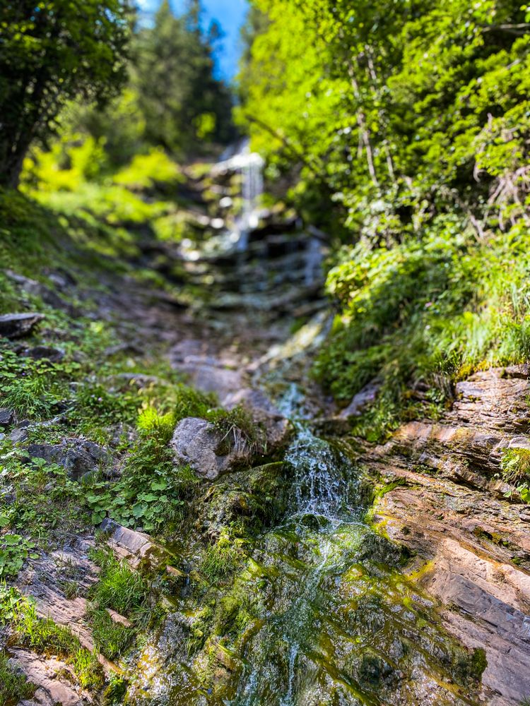 Arnensee Waterfall in Swiss mountains