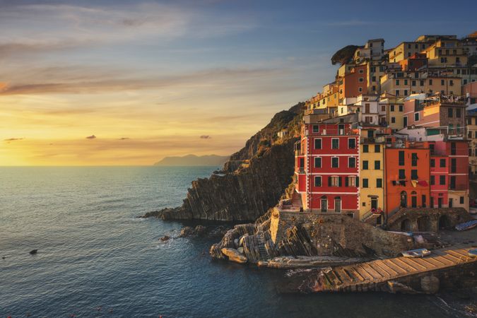 Wonderful sunset over Riomaggiore fishing village, Cinque Terre, Italy