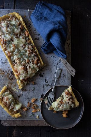 Delicious pumpkin cake on tray near plate