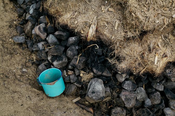 Pile of coal covered with pressed mulch