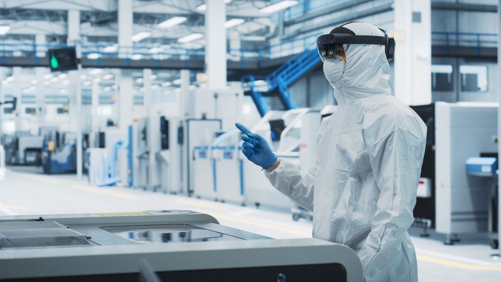 Person working in hazmat suit
