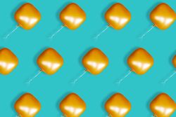 Rows of orange square balloons