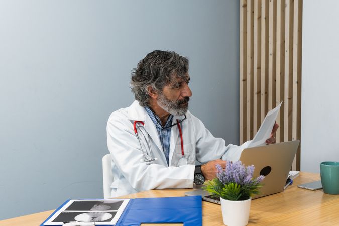 Doctor examining x ray in hospital