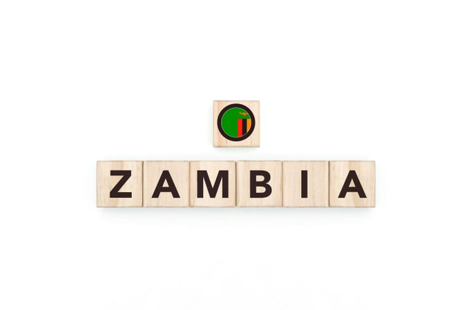 Wooden blocks bearing the name and flag of Zambia.