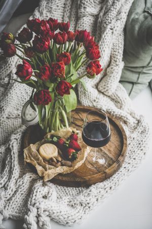 Wine and snacks with flowers