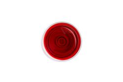 Glass with red wine isolated on blank background, top view