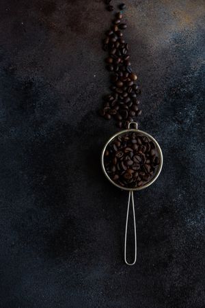 Measurement of coffee beans on counter