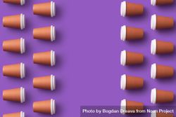 Disposable coffee cups on the sides on purple background 4ApW65