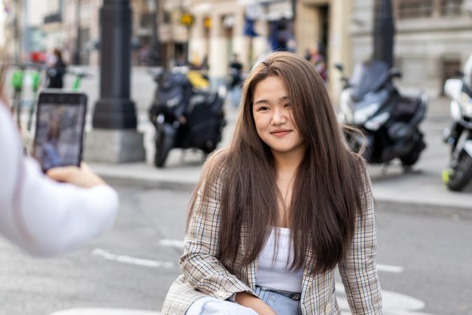 Asian Female Tourists Capturing Memories in Madrid