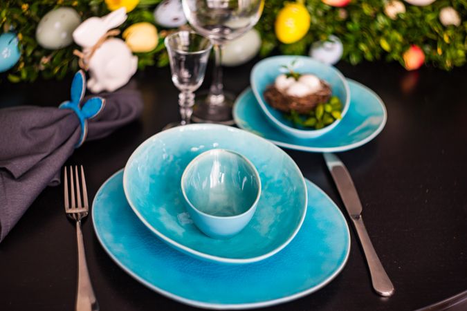 Blue plates on spring themed table