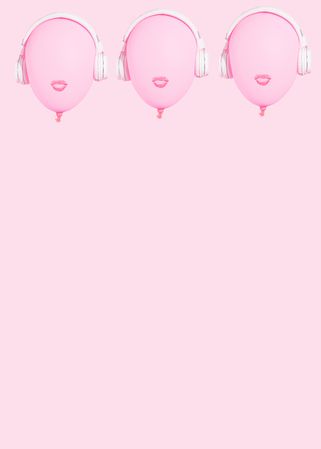 Three pink balloons with lips wearing headphones with copy space