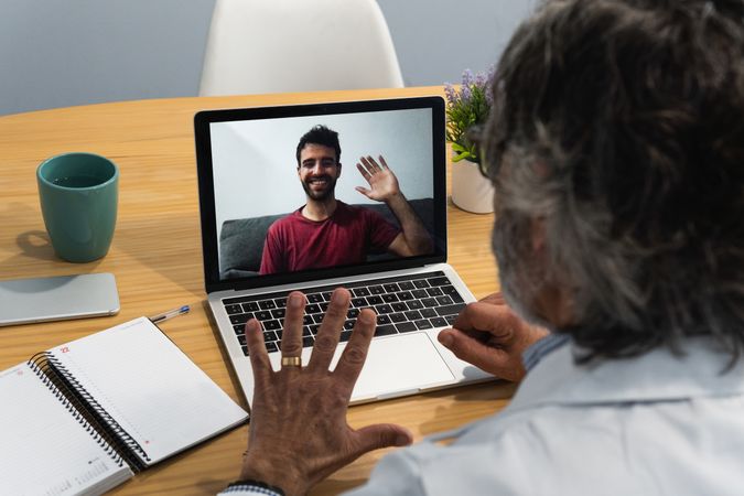 Doctor conducting telemedicine consultation with patient