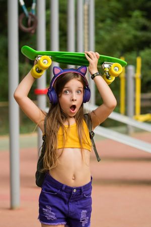 Girl with Skateboard on head