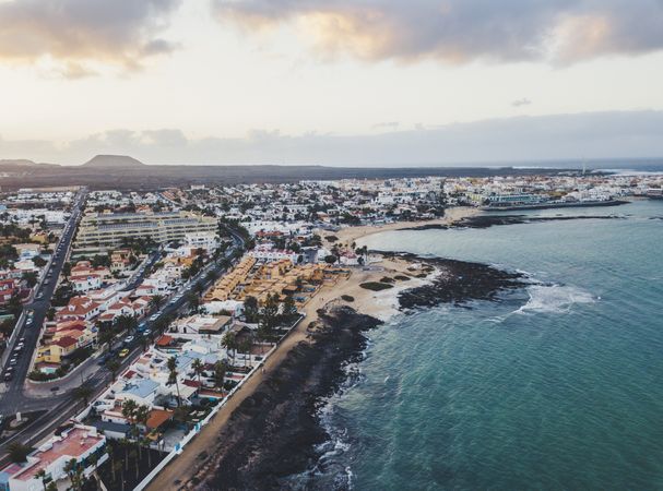 Scenic aerial view of city on ocean shore