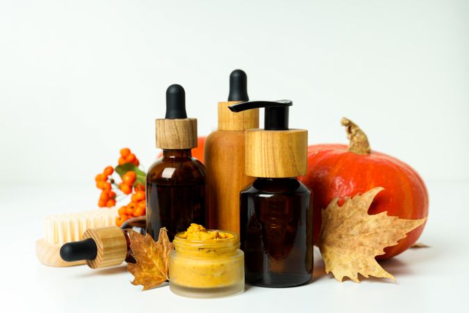 Skin care and face care concept - pumpkin cosmetic