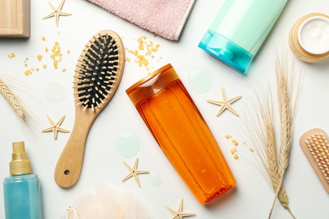 Hygiene composition with shampoo bottles on light background