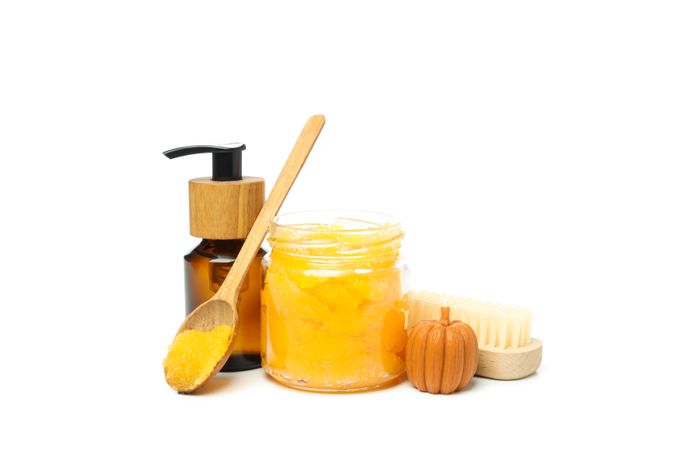 Concept of different cosmetic products, Pumpkin cosmetics, isolated on light background