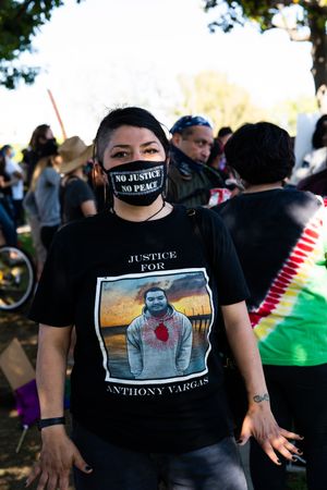 Los Angeles, CA, USA — June 7th, 2020: woman with “no justice no peace mask” at rally