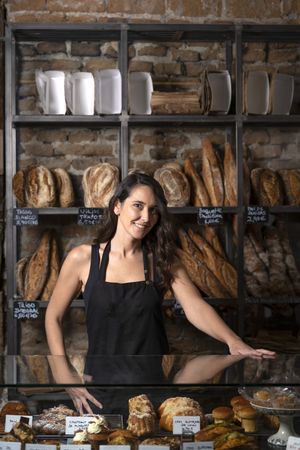 Young female selling baguettes