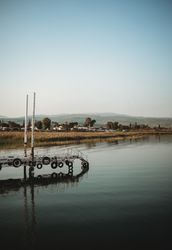 Weathered pier near calm water