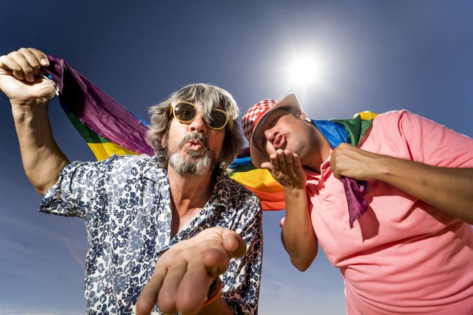 Excited gay couple in desert