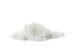 Coconut flakes isolated on light background. Tropical fruit