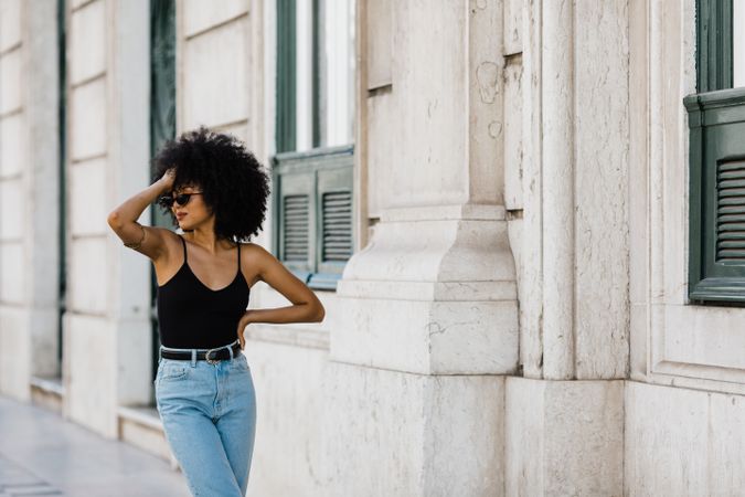 Cheerful  female in dark sunglasses