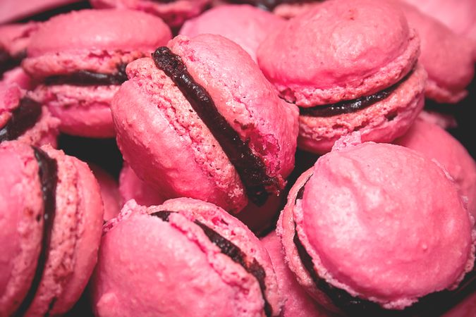 Pink macarons in macro style. Pink cupcakes.