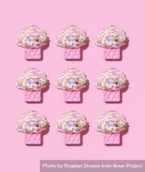 Cute muffin toys on pink background 42LzK0
