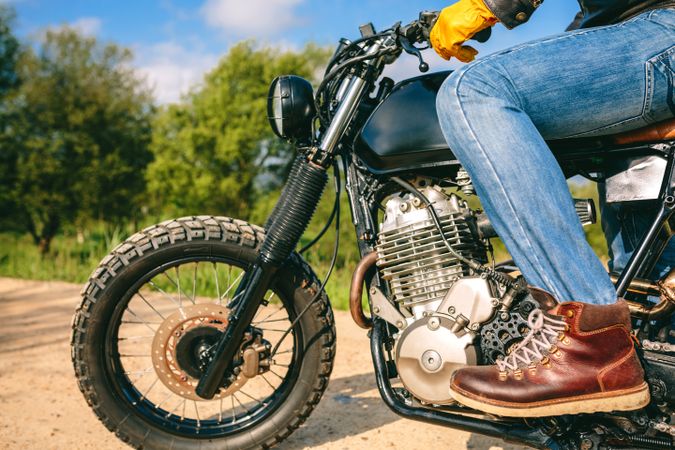 Man riding custom motorbike