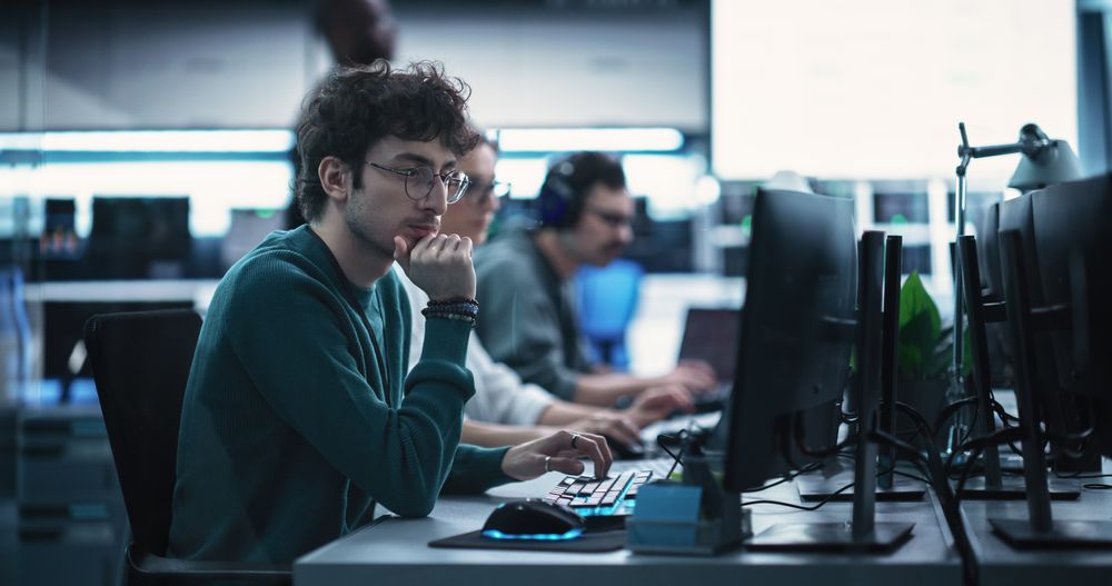 Woman Wearing Headphones, Writing Software Code for an Innovative Internet Projects