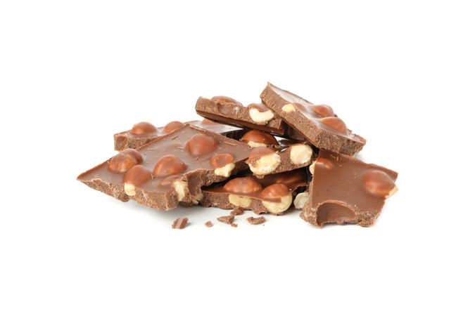 Tasty chocolate pieces isolated on blank background