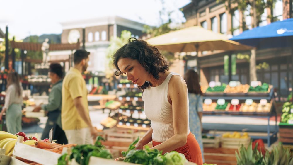 Customer Shopping for Fresh Seasonal Fruits and Vegetables for a Mediterranean Dinner.