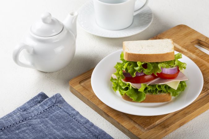 Natural sandwich. Sandwich with cheese, ham, lettuce, tomato and red onion.