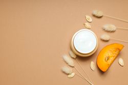 Concept of different cosmetic products, Pumpkin cosmetics, space for text
