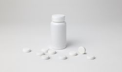 Mockup of a closed aspirin bottle, plastic material