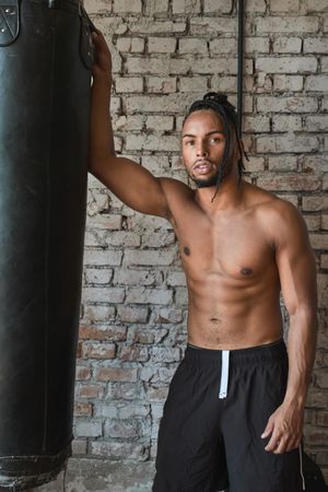 Confident Black boxer in gym