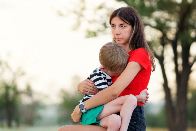 Affectionate mom with son outdoor