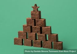 Chocolate fudge pile, on a green background 0gDWe5