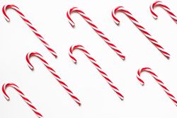 Candy Cane on a plain background. Christmas theme background.