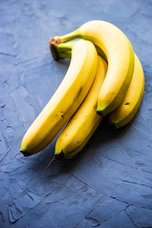 Fresh banana fruits on concrete background