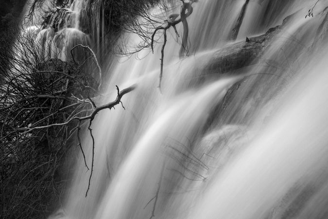 Wonderful waterfall near tree
