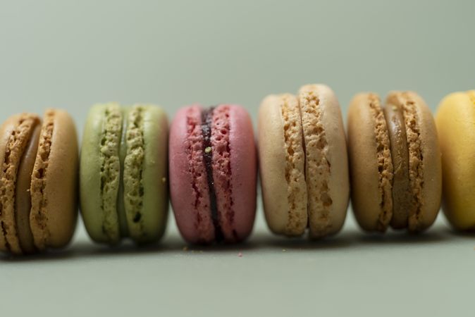 Colorful macaroons lined up on a table