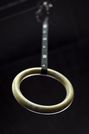 Gymnastic ring hanging in gym