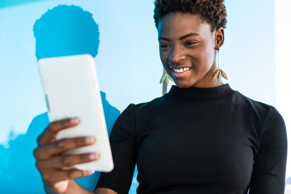 Content female taking selfie