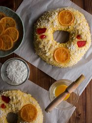 Yolk and sugar near Rosca de Reyes with fruits